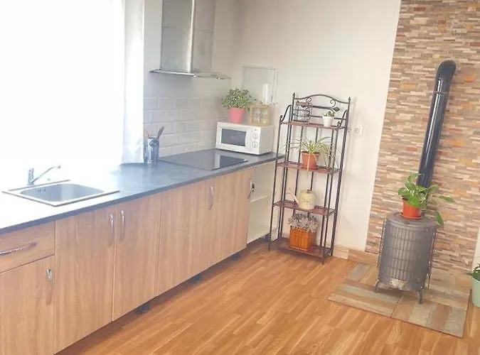 El Atardecer- El Peral アパートホテル